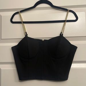 Gold strap corset crop top.